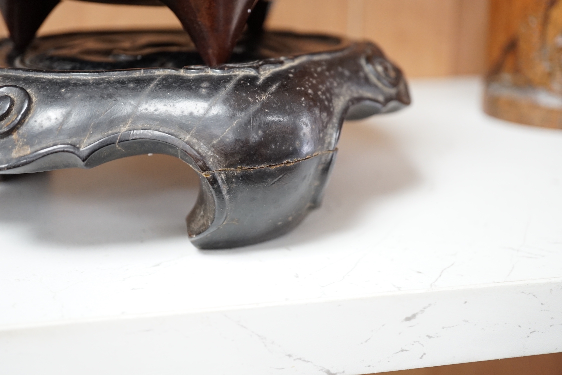 A Chinese bronze censer, with engraved detail, on hardwood stand, censer 16cm diam.